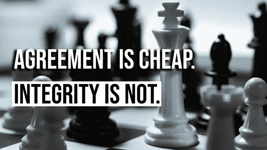 Black-and-white chessboard with a white king piece standing tall in focus. Bold text overlaid reads: ‘Agreement is cheap. Integrity is not.